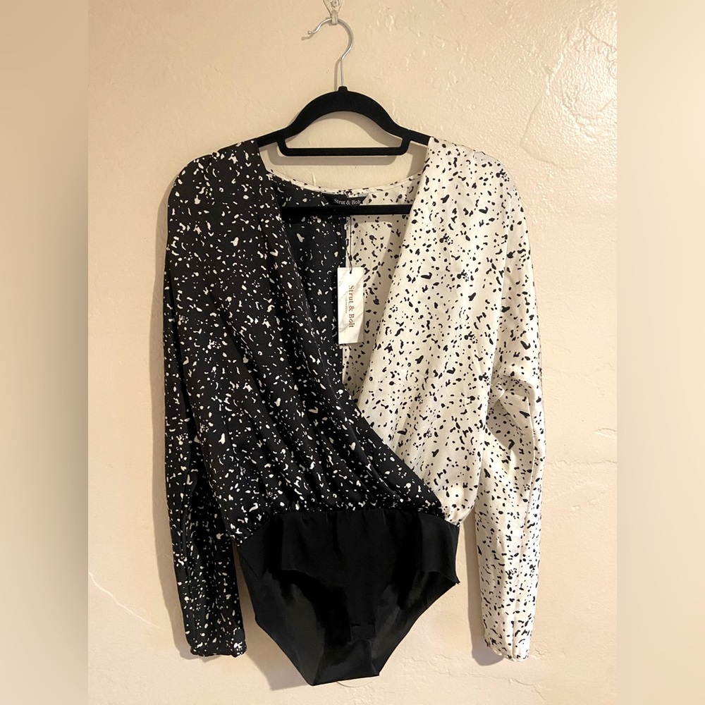 Two tone body suit from VICI. Medium. New with tags.